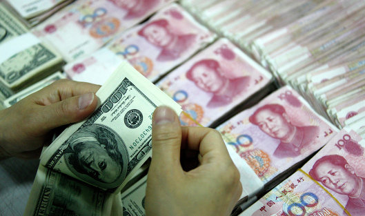 ЦБ Китая ослабил курс юаня до 6,9086 за доллар